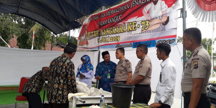 Peringati HUT Bhayangkara Polres Donggala Gelar Lomba Mengurus Jenazah
